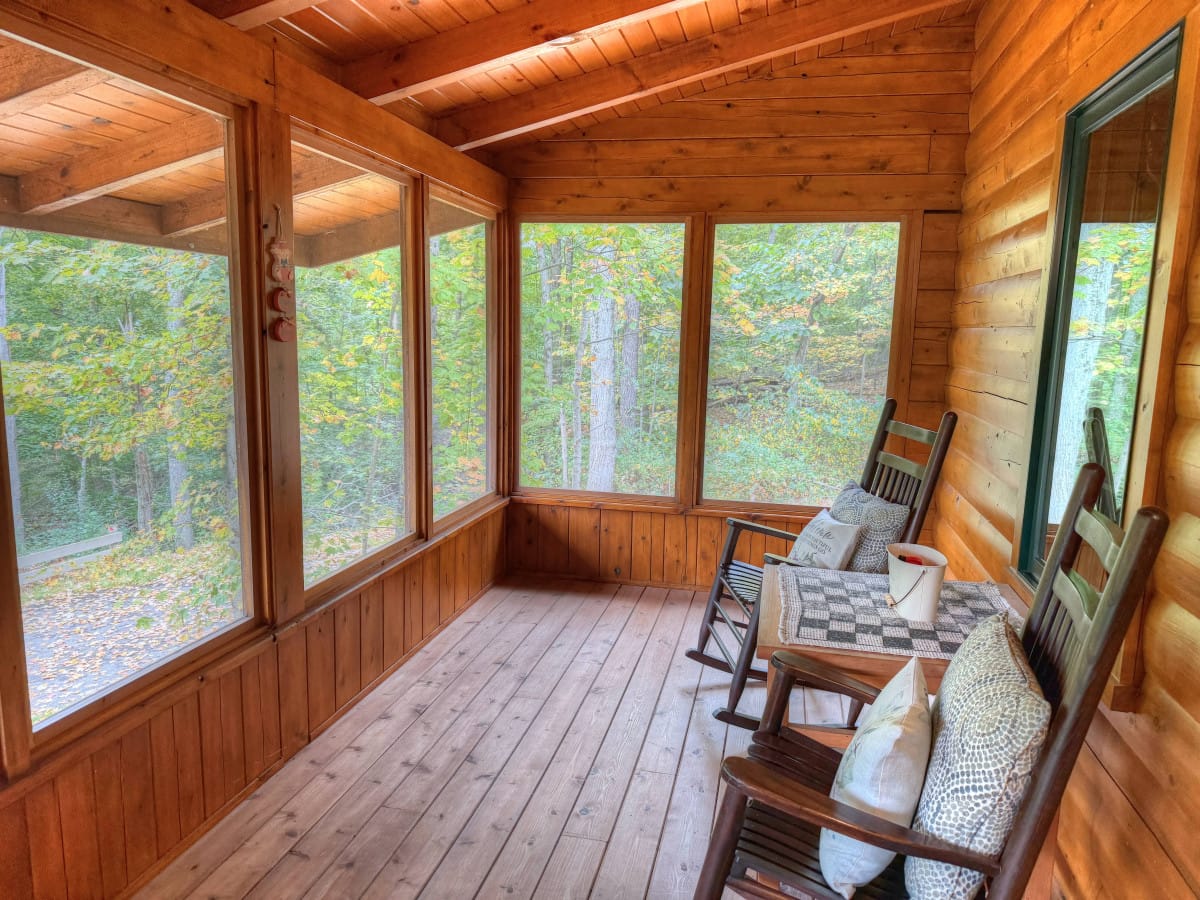A screened porch looking into the woods at Ferngully Creek near Millersburg, Ohio